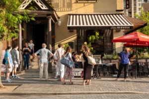 Toronto, Canada - August 29, 2023: People walk and shop along the streets of the fashionable and upscale Yorkville area of downtown Toronto