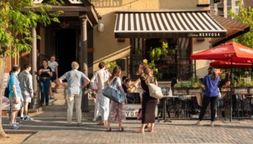 Toronto, Canada - August 29, 2023: People walk and shop along the streets of the fashionable and upscale Yorkville area of downtown Toronto