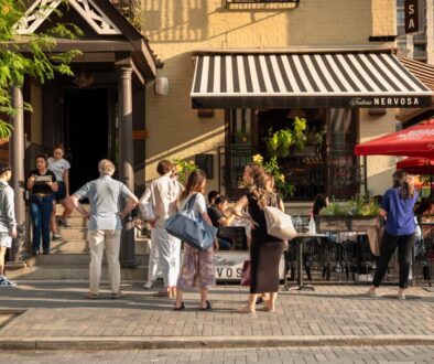 Toronto, Canada - August 29, 2023: People walk and shop along the streets of the fashionable and upscale Yorkville area of downtown Toronto